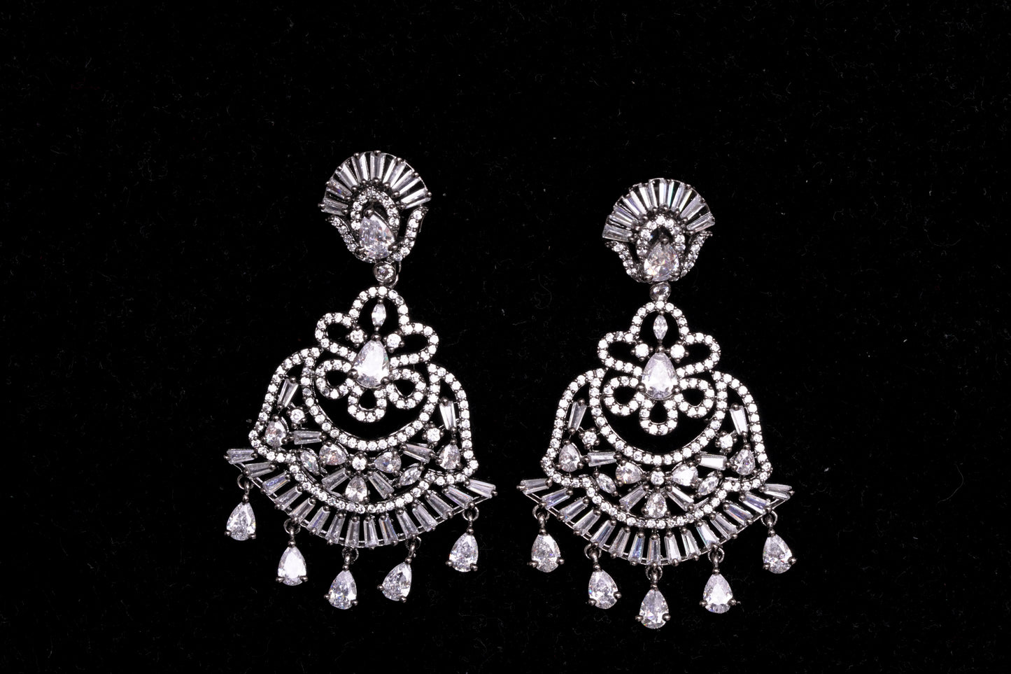 Stunning, chandelier earrings with real American diamond in a glittering finish