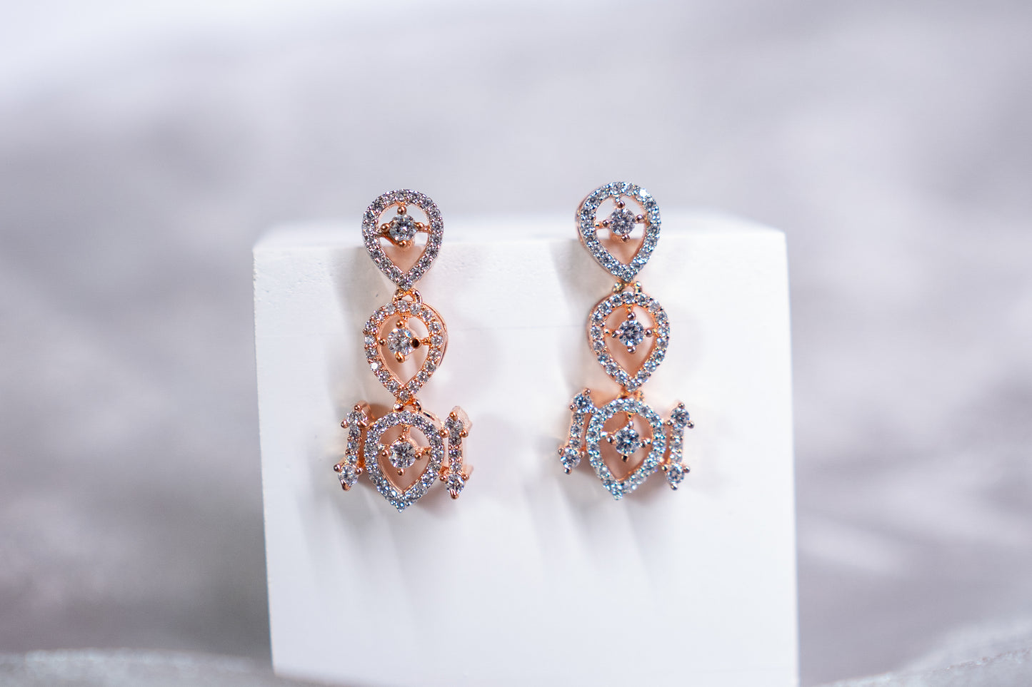 Tear drop earrings in American diamond in a rose gold finish