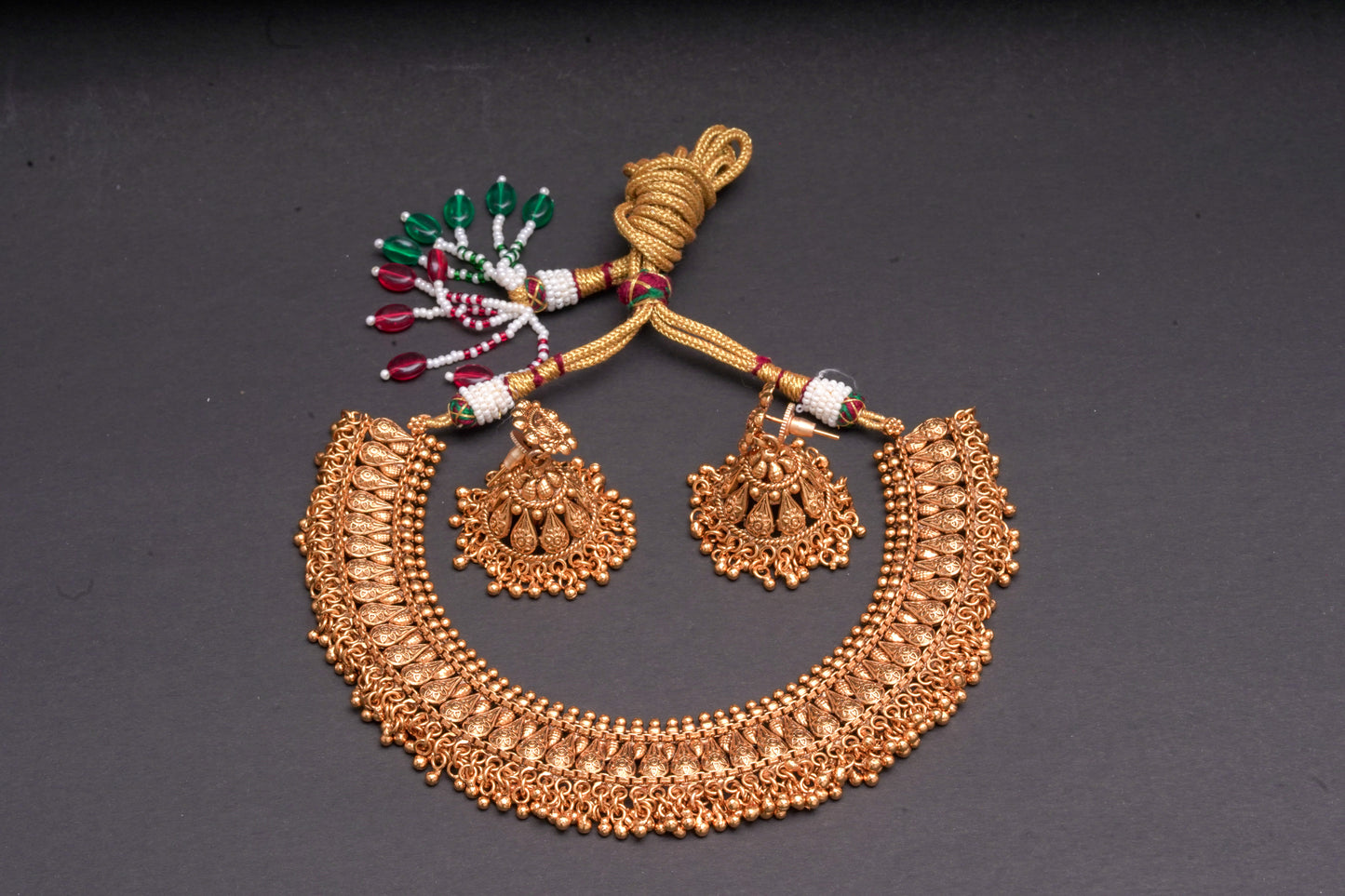 Unique traditional Indian necklace set with jhumkas in gold finish